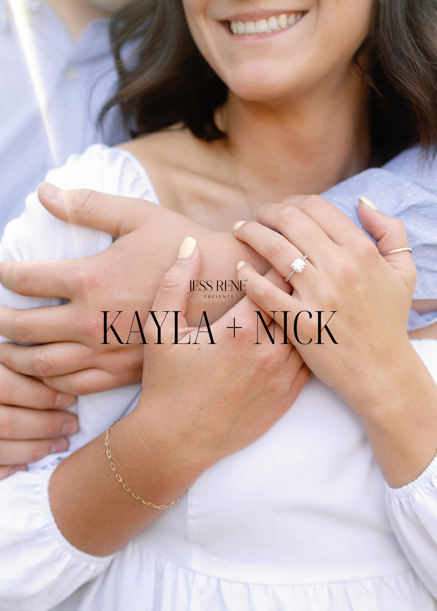 Couple holding hands up close with engagement ring showing.