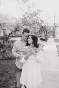 black and white image of a couple hugging during their spring engagement session