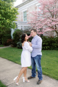 colorful spring engagement of a couple dancing