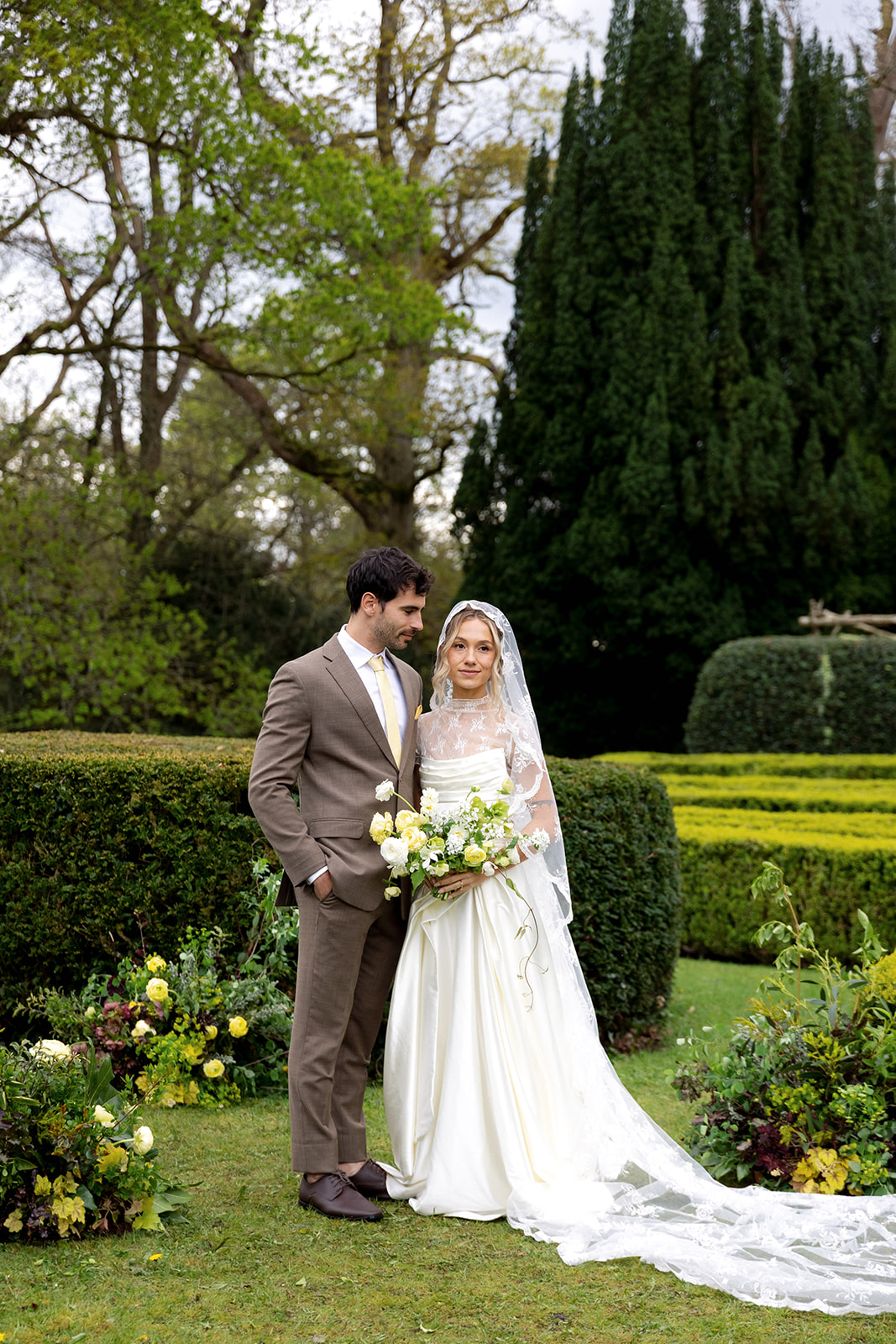 couple standing in for ceremony portraits