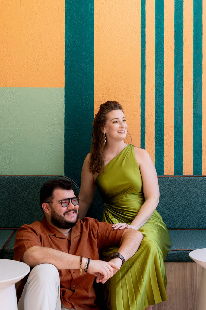 Couple sitting at joui wine